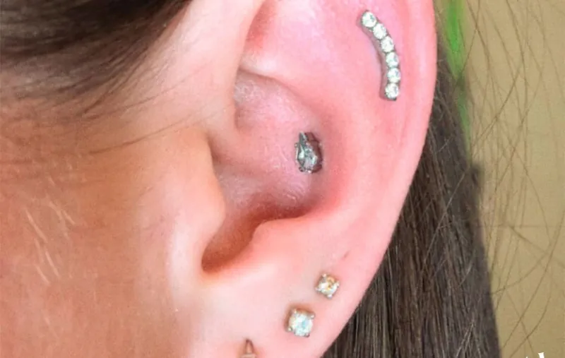 Тройной пирсинг мочки уха (Triple Lobe Piercing)